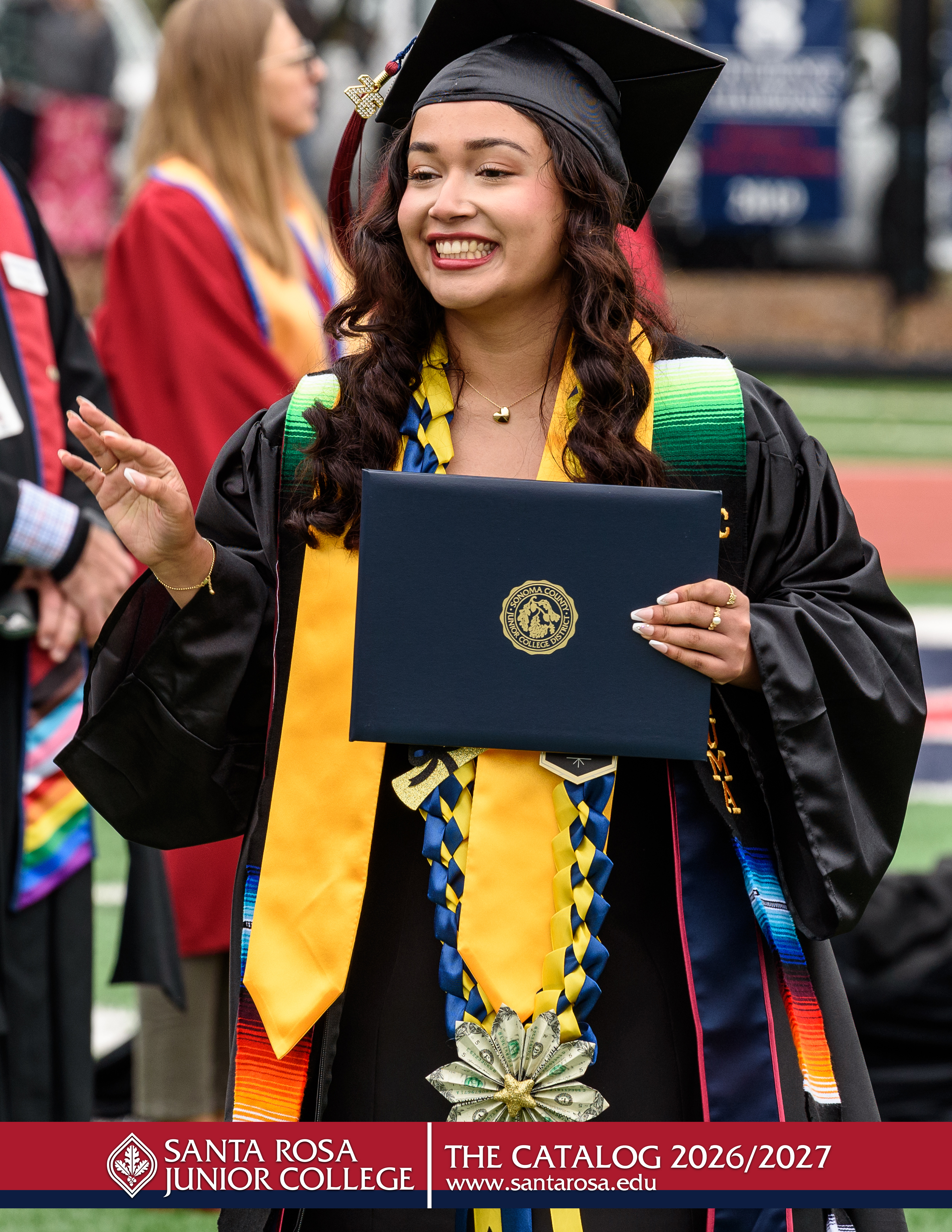 Picture of female smiling srjc graduate. Santa Rosa Junior College The Catalog 2026/2027 www.santarsoa.edu